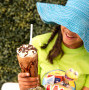 Kid enjoying Waffling Whale freakshake