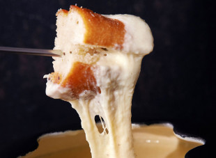 Dip and Dine: The President Hotel’s Fondue Experience is Back