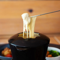 Dip and Dine: The President Hotel’s Fondue Experience is Back